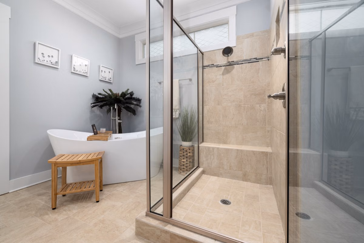 Luxury shower installation with rainfall head and frameless glass